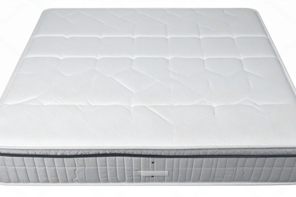 What Type of Mattress Is Best for Stomach Sleepers? A mattress in a white background.