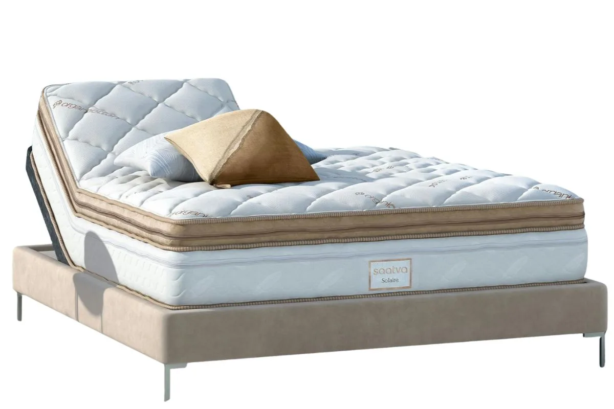 Saatva Solaire Adjustable Firmness Mattress on an adjustable base highlighting customizable comfort and features discussed in user reviews