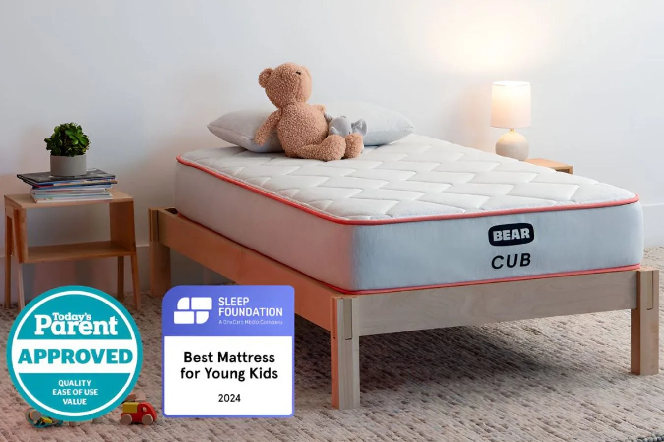Bear Cub kids mattress on wooden bed frame with awards badges