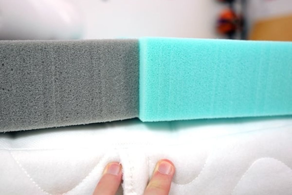 Close-up of foam layers showing firmness variation and sinkage response