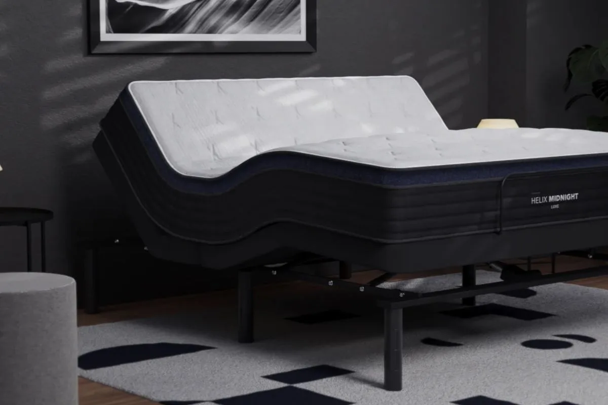 Adjustable split king Helix Midnight Luxe mattress raised for customized support