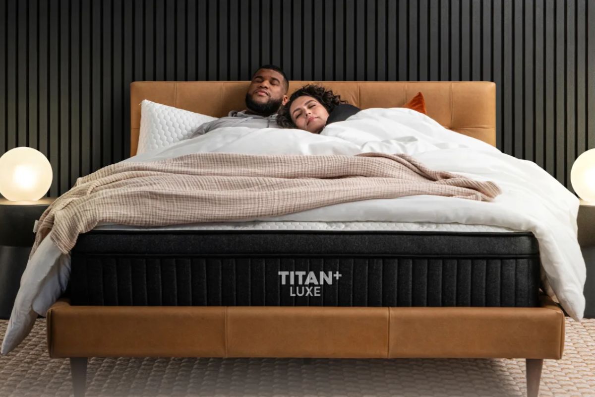 Couple relaxing on a Titan Plus Luxe Mattress during the sleep trial period to test comfort and support for heavier sleepers