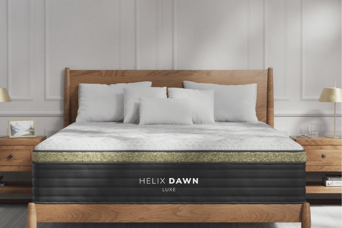 helix dawn luxe mattress on wooden bed frame with white bedding and pillows