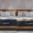 Side-by-side comparison of the Helix Midnight Luxe and Helix Dawn Luxe mattresses highlighting key design differences