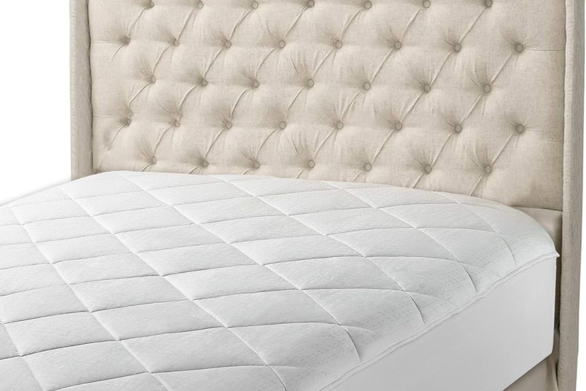Twin XL mattress with a quilted mattress topper illustrating overall mattress thickness and added comfort layers