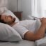 Back sleeper resting in a neutral position, demonstrating proper spinal alignment to help prevent back pain during sleep