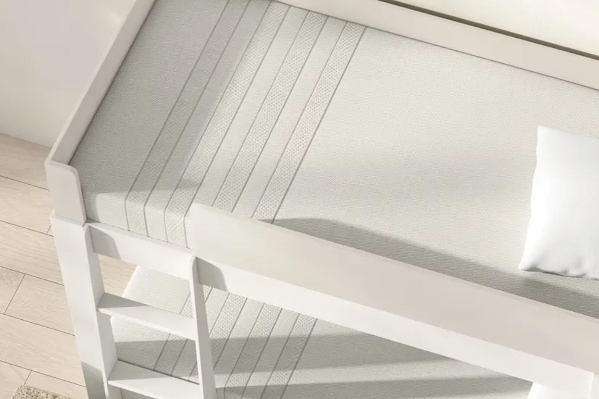 Leesa Kids Mattress fitted on a bunk bed frame, showcasing its low-profile design and suitability for children's sleep environments