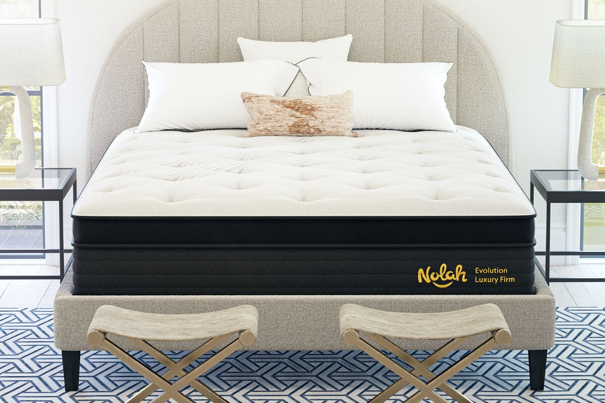 nolah evolution 15 luxury firm mattress on upholstered bed frame with tufted pillow top