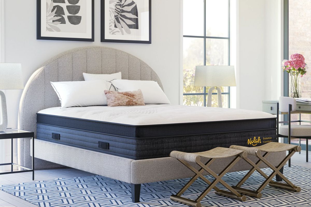 Nolah Evolution Comfort+ mattress displayed in a bedroom, representing the overall sleep experience and common user feedback about comfort and support