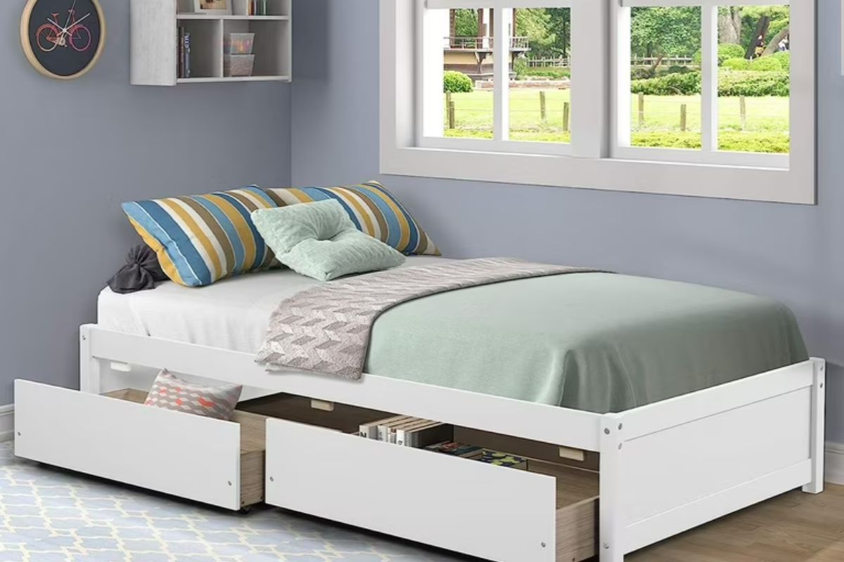 Twin bed with built-in storage drawers showing the standard dimensions and space-saving design of a twin bed