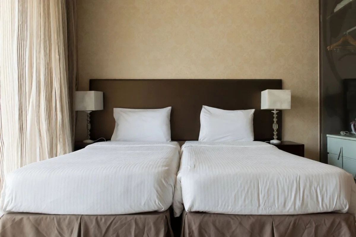 What Mattress Size Is Best for Couples? Two twin beds placed side by side, showing an alternative sleep arrangement for couples with different comfort preferences
