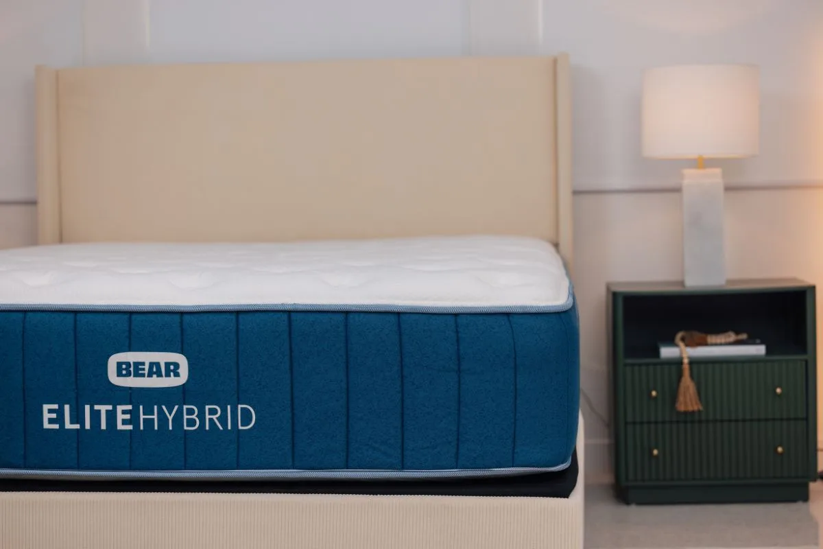 Bear Elite Hybrid mattress side view with safety certifications including fiberglass-free and Greenguard Gold labels