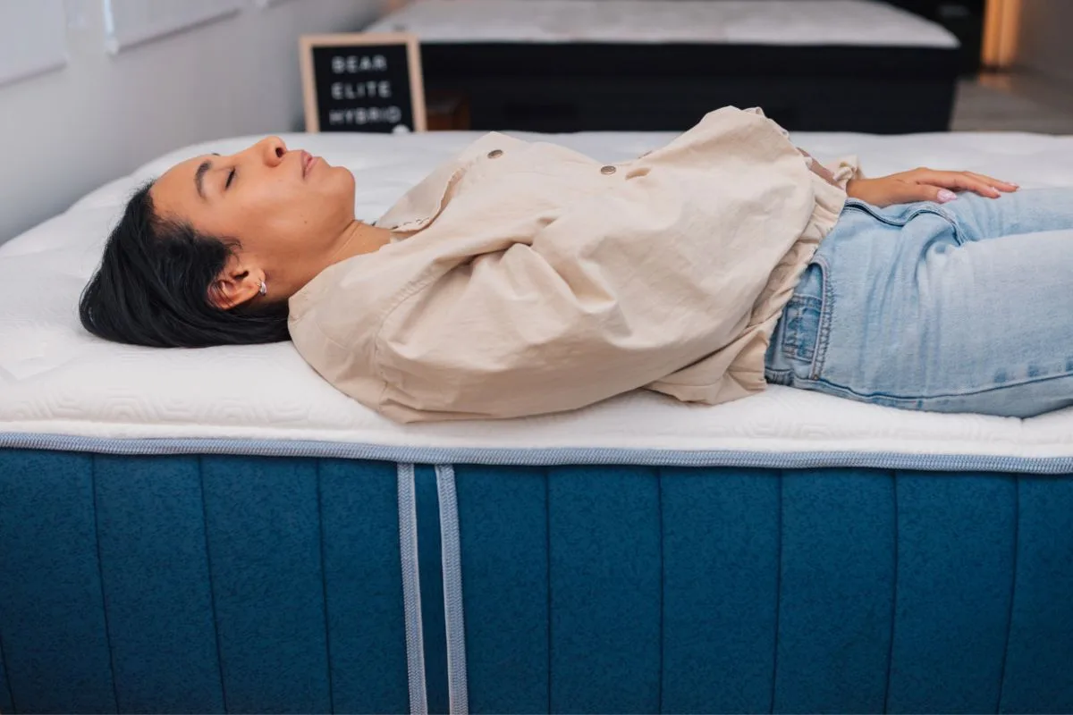 Cross-section of Bear Elite Hybrid mattress illustrating internal layers and materials used for support and safety