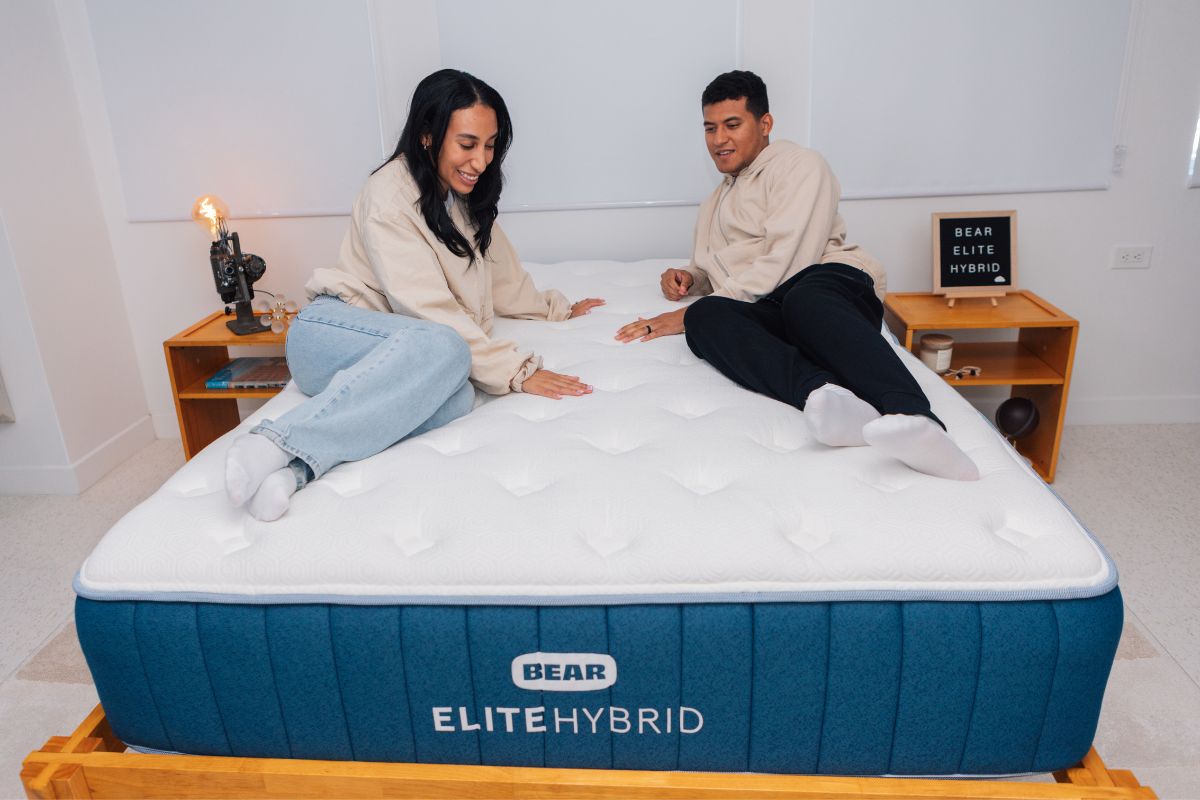 Bear Elite Hybrid innerspring hybrid mattress supporting two adults comfortably, showcasing responsive coil support, pressure relief, and spacious comfort for couples and combination sleepers