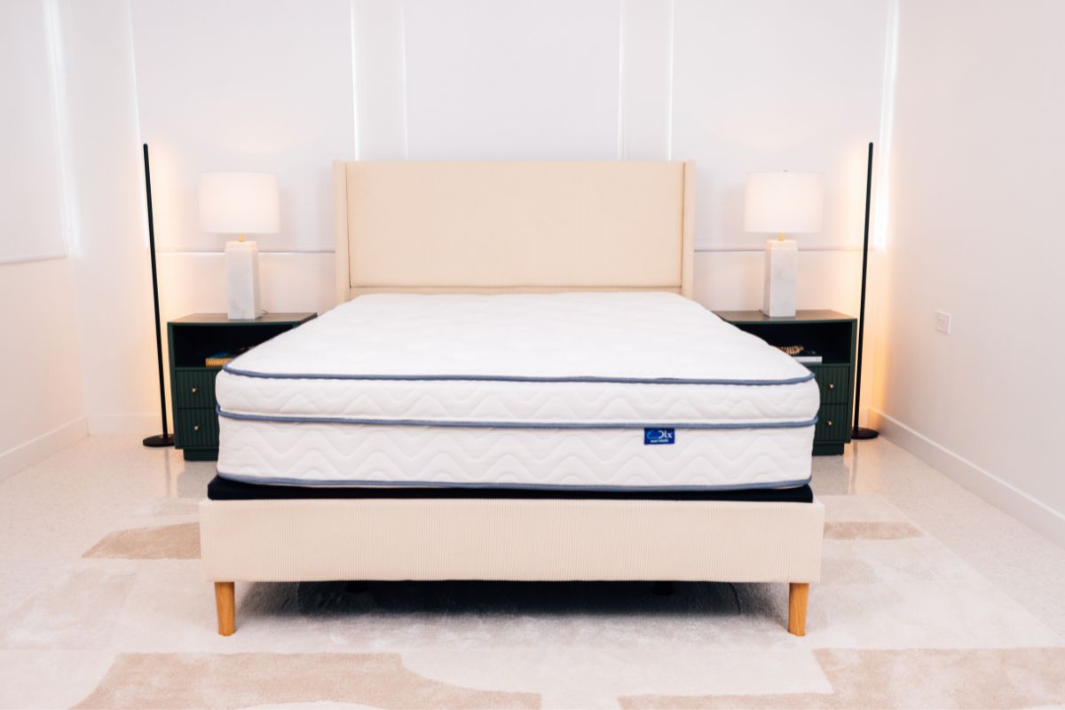 DLX Premier Hybrid mattress on an adjustable bed base highlighting customizable support, pressure relief, and comfort for seniors seeking restful sleep