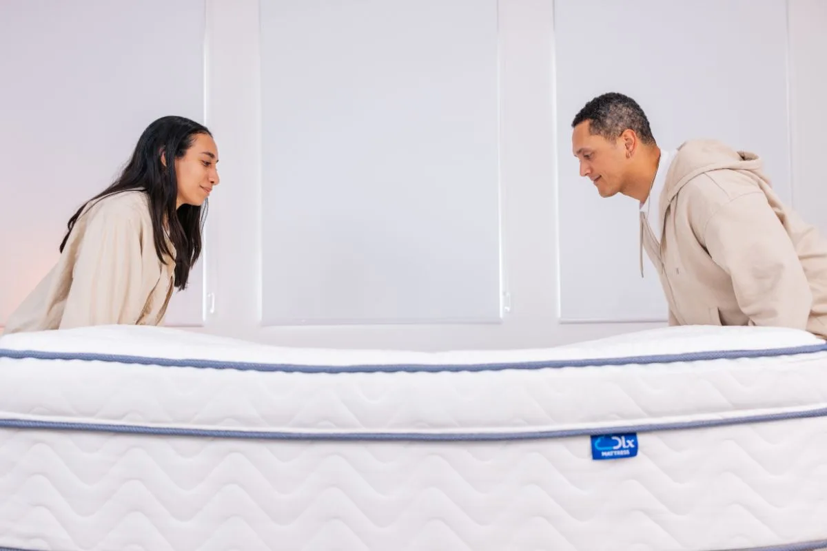 Side view of the DLX LatexLux Hybrid Mattress showing its construction and condition for a potential mattress return
