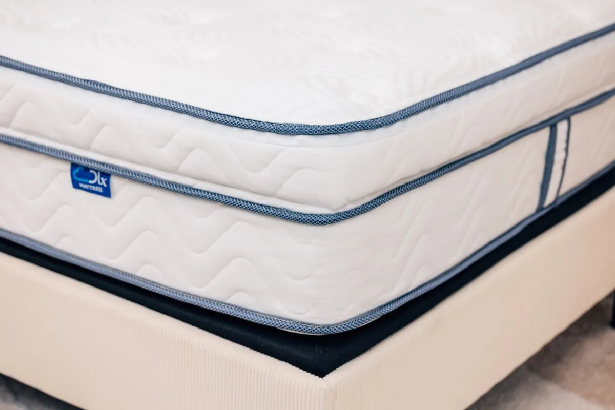 Close-up of the DLX LatexLux Hybrid Mattress surface showcasing its plush comfort during the trial period