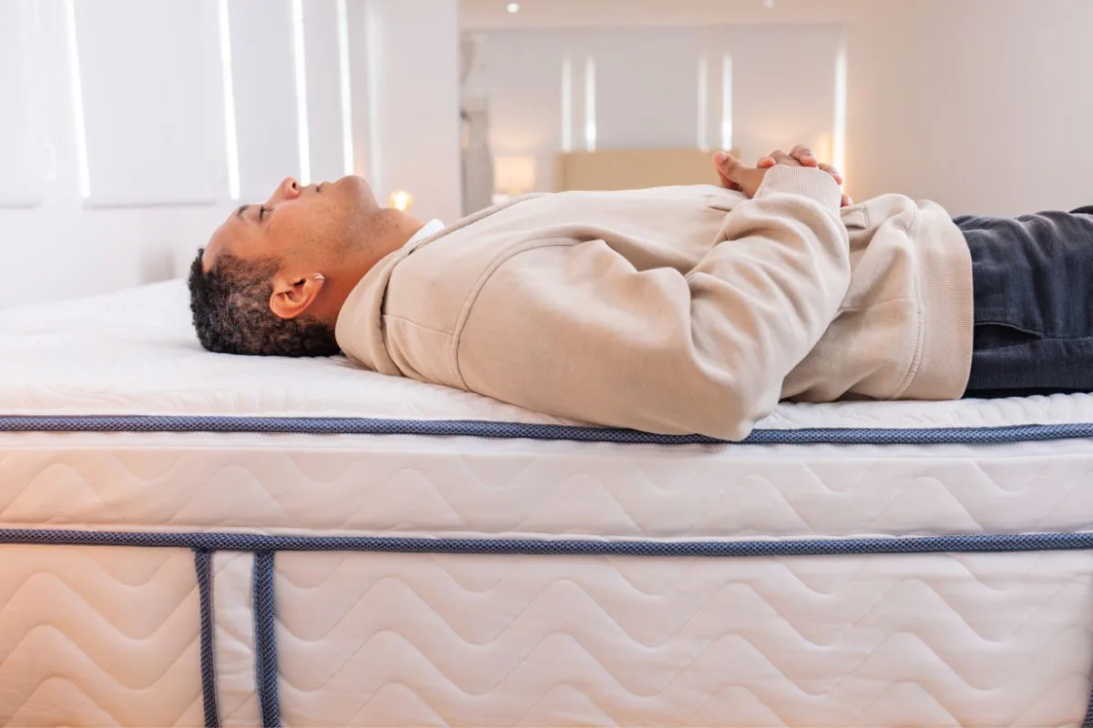 Side view of the DLX LatexLux Hybrid Mattress displaying its profile, edge support, and hybrid construction