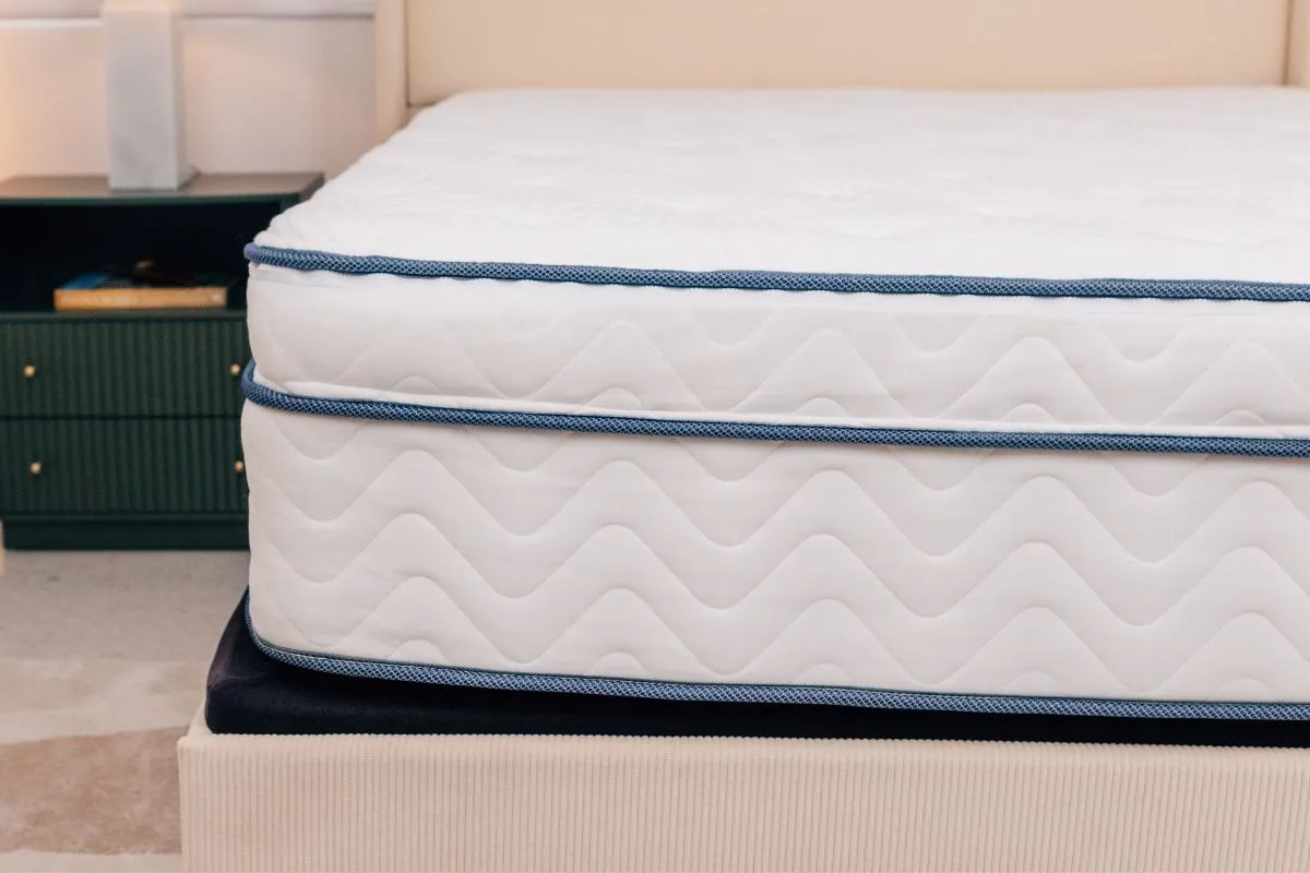 Side view of the DLX LatexLux Hybrid Mattress highlighting its durable hybrid construction for long-term performance