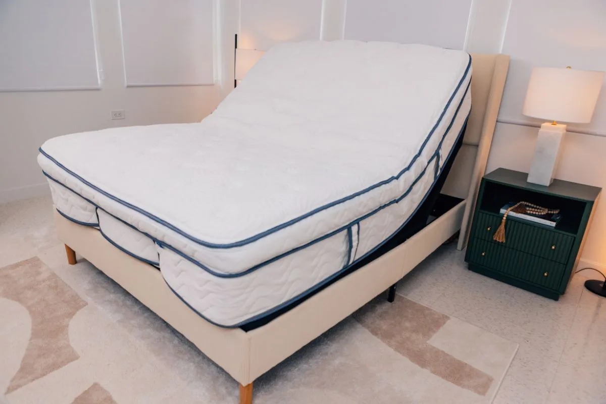 DLX Premier Hybrid mattress on an adjustable base demonstrating compatibility with split king adjustable foundations