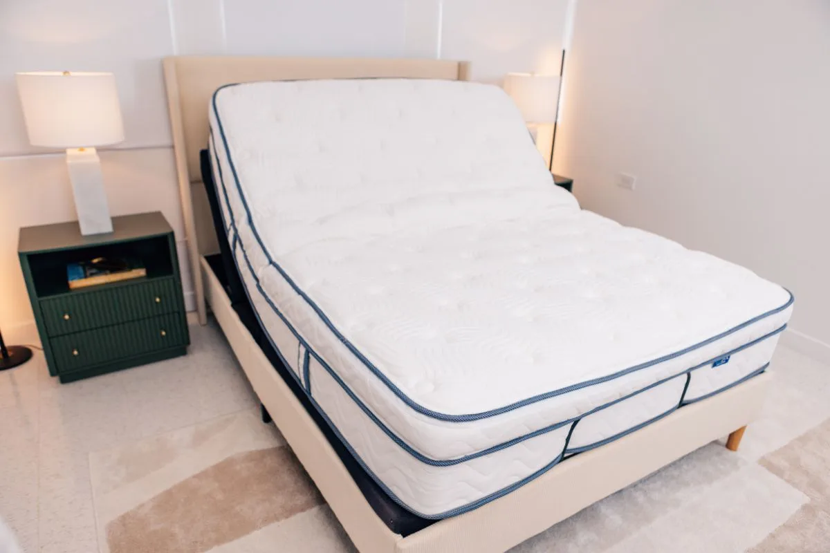 Layered mattress construction diagram showing foam and coil support system