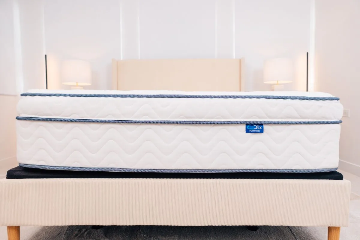 Front view of the DLX Premier Hybrid mattress highlighting its profile and support system in the Helix Midnight Luxe vs DLX Premier Hybrid comparison