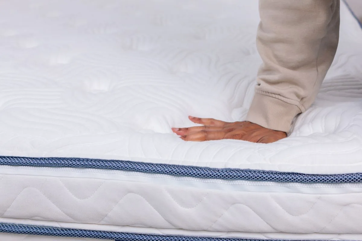 DLX Premier Hybrid mattress setup in bedroom illustrating real-life use during trial period