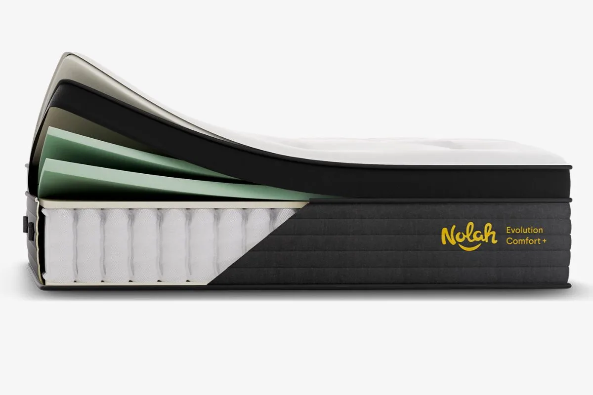 Nolah Evolution Comfort+ mattress cutaway showing premium foam layers and coil system that help preserve support and maintain warranty coverage